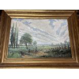 A framed oil painting on canvas study of a field w