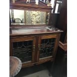 NO RESERVE - An Edwardian display cabinet with a m