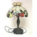 A Tiffany lead-light reproduction table lamp.