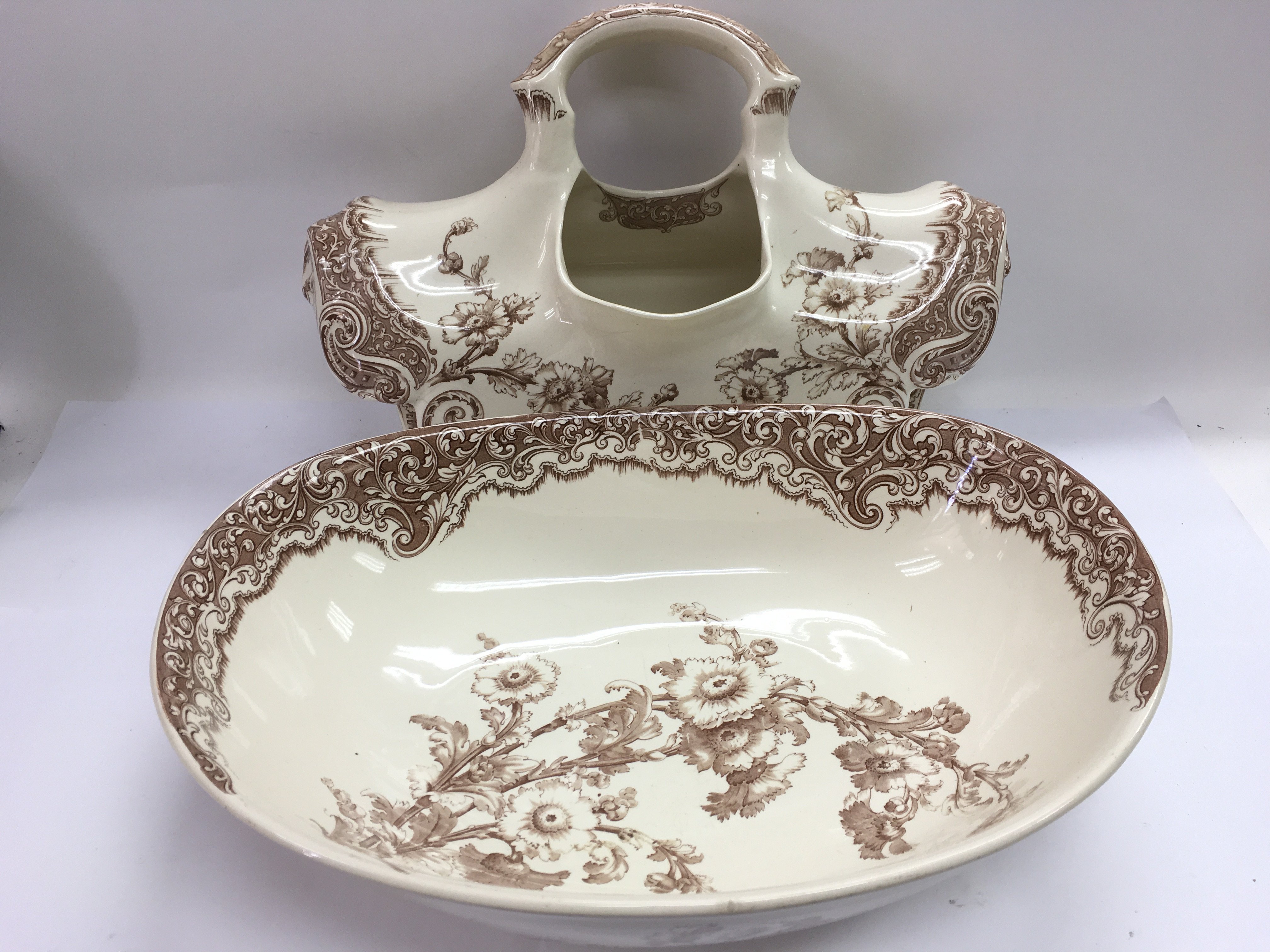 A Victorian jug and bowl set with floral decoratio