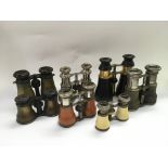 Seven pairs of antique binoculars / opera glasses.