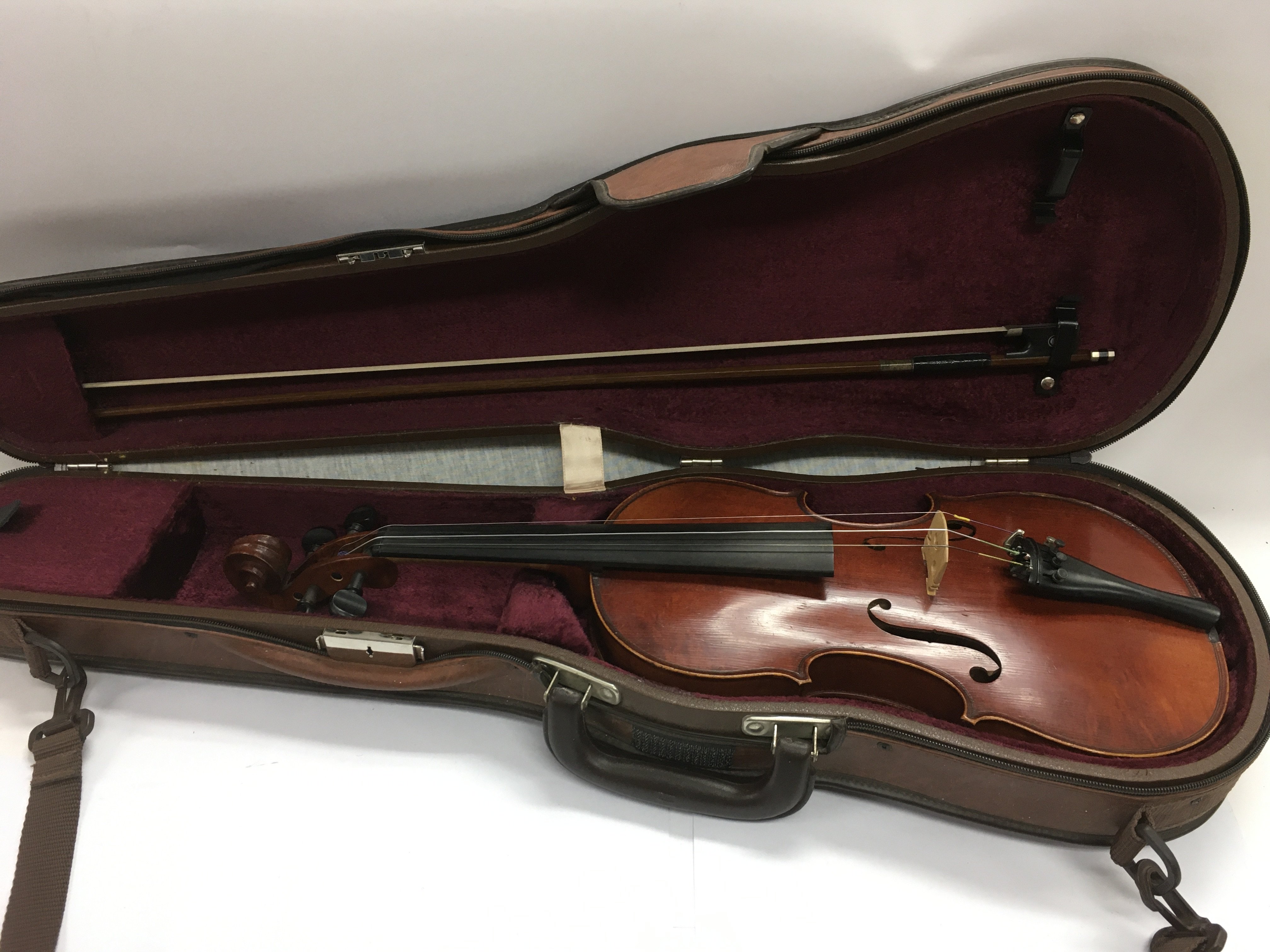 A circa 1920 Thibouville Lamp cased violin with bow.