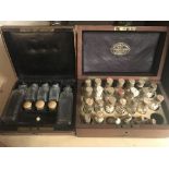 Four Victorian boxes containing apothecary bottles