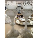 A pair of Victorian glass lustres with loose cut g