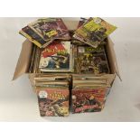 A large collection of vintage Commando comics