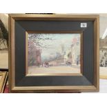 A 1930s oil on canvas town scene, attributed to J.B.Yates. Monogram to lower left.