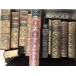 A collection of leather bound books including the