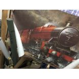 A box containing a collection of reproduction railway pictures and posters