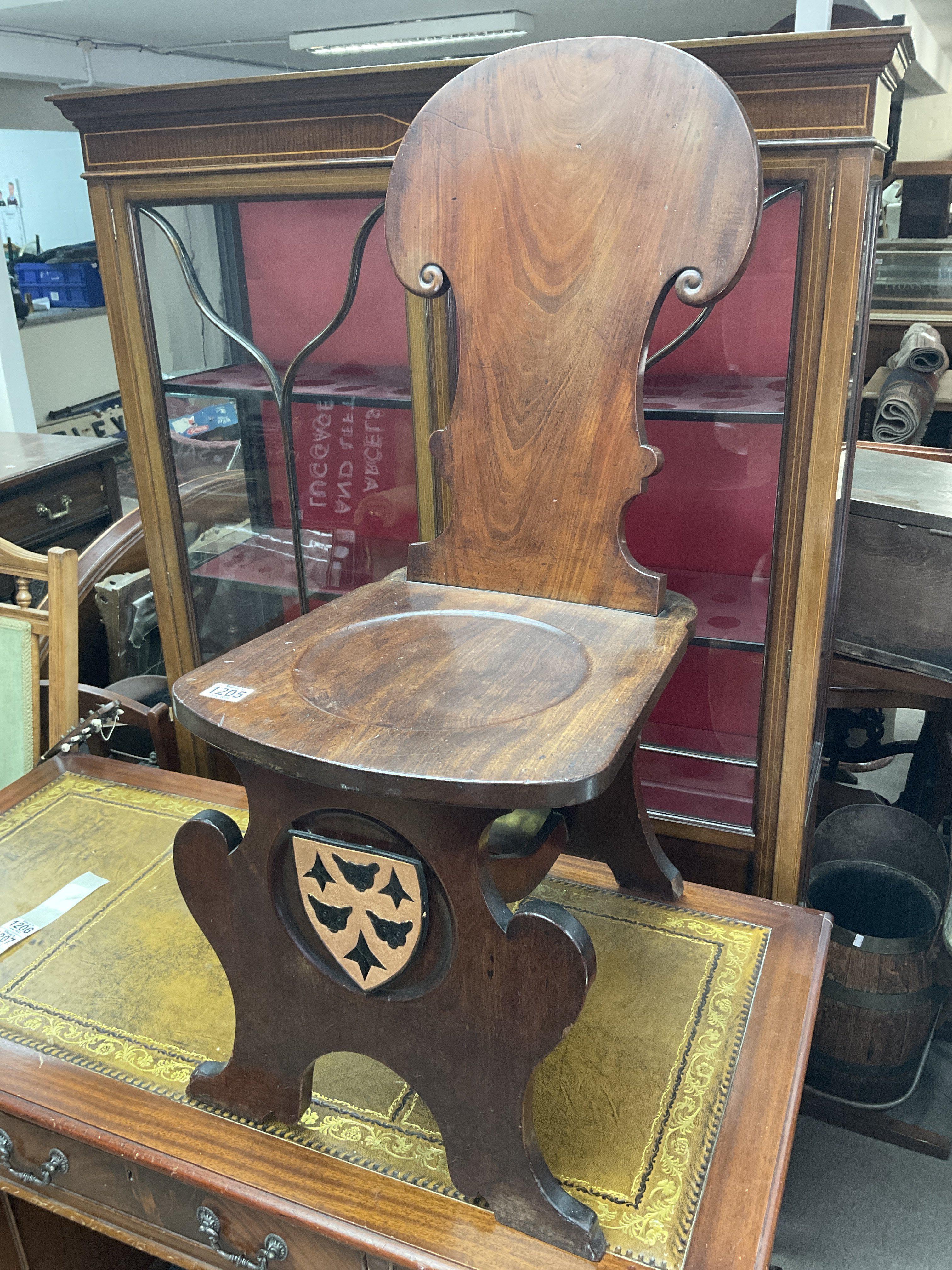 A Victorian scroll backed hall chair.