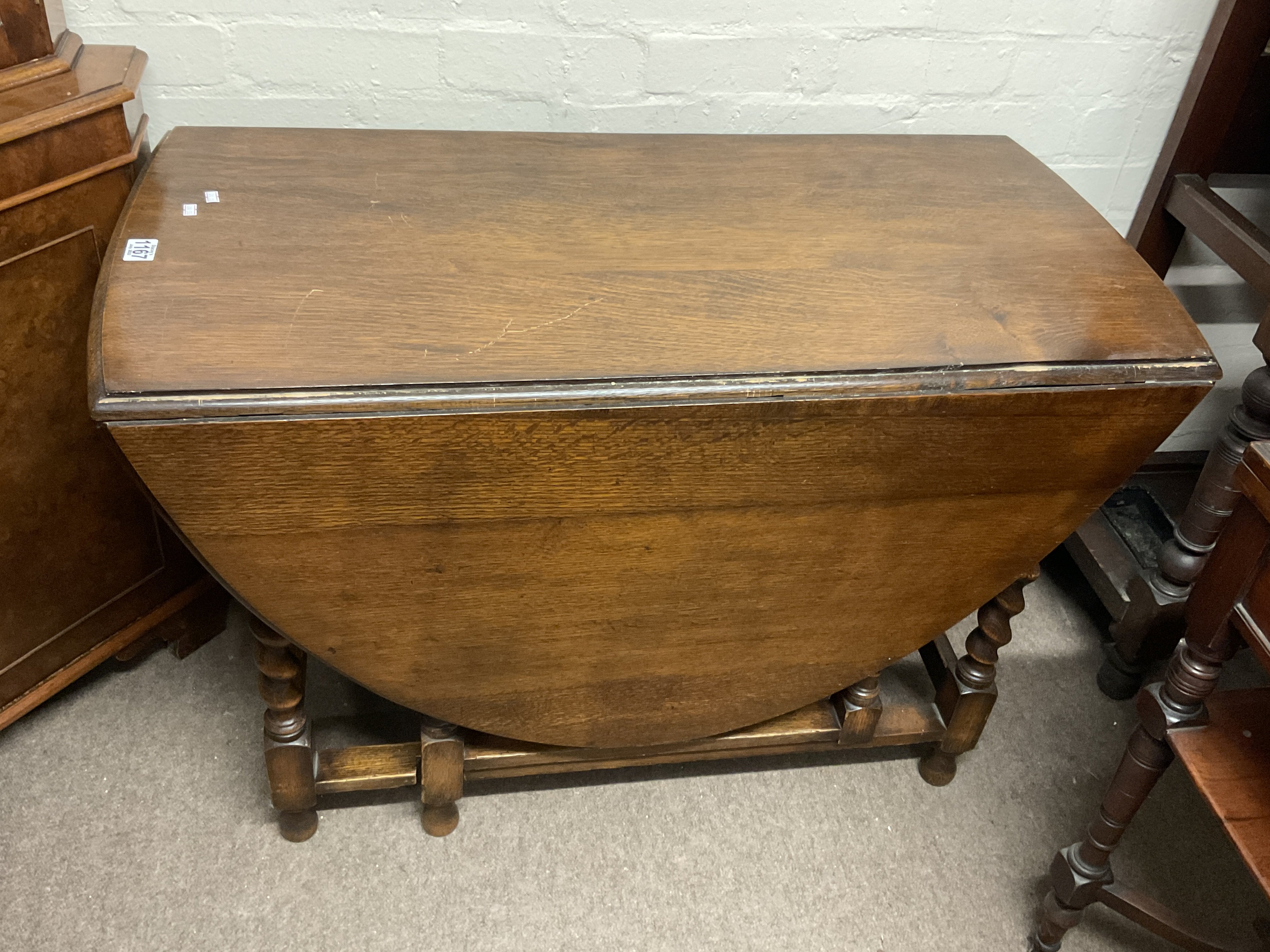 An oak drop leaf table.