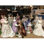 A collection of porcelain figurines including Coal