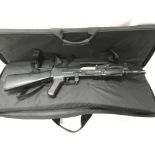 A Japanese airsoft semi automatic assault rifle with magazines and carry case.