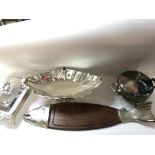 Various serving dishes and silver plate food warme