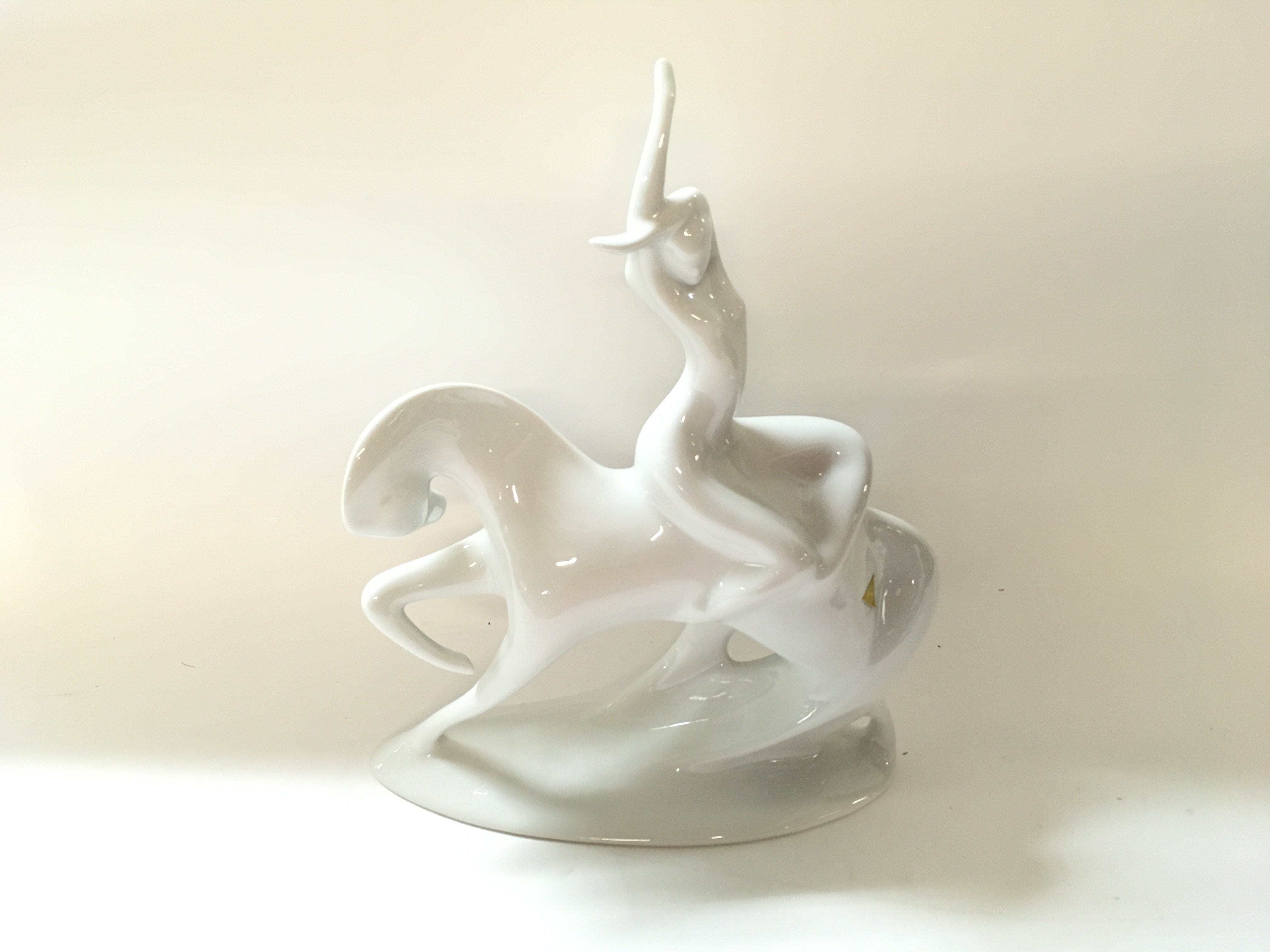 Royal Dux modernist Figurine of a lady and horse.