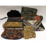 A collection of eight vintage beaded bags and purs