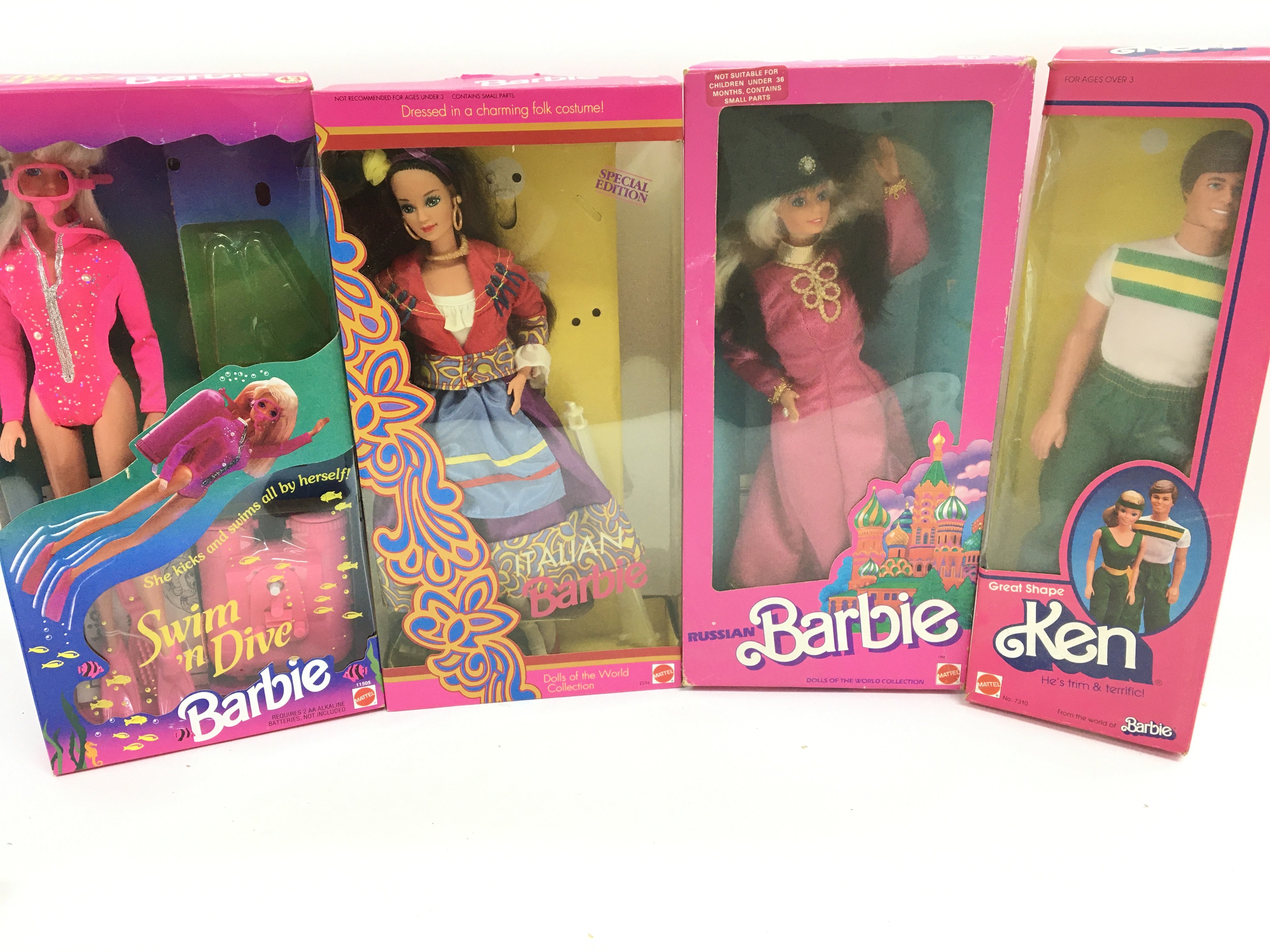 3 X Boxed Barbies and a Boxed Ken.(4).