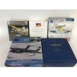 A collection of various die cast models including