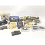 Collection of various models and die cast vehicles