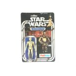 A Vintage Star Wars Palitoy 1977 Carded C3PO. One