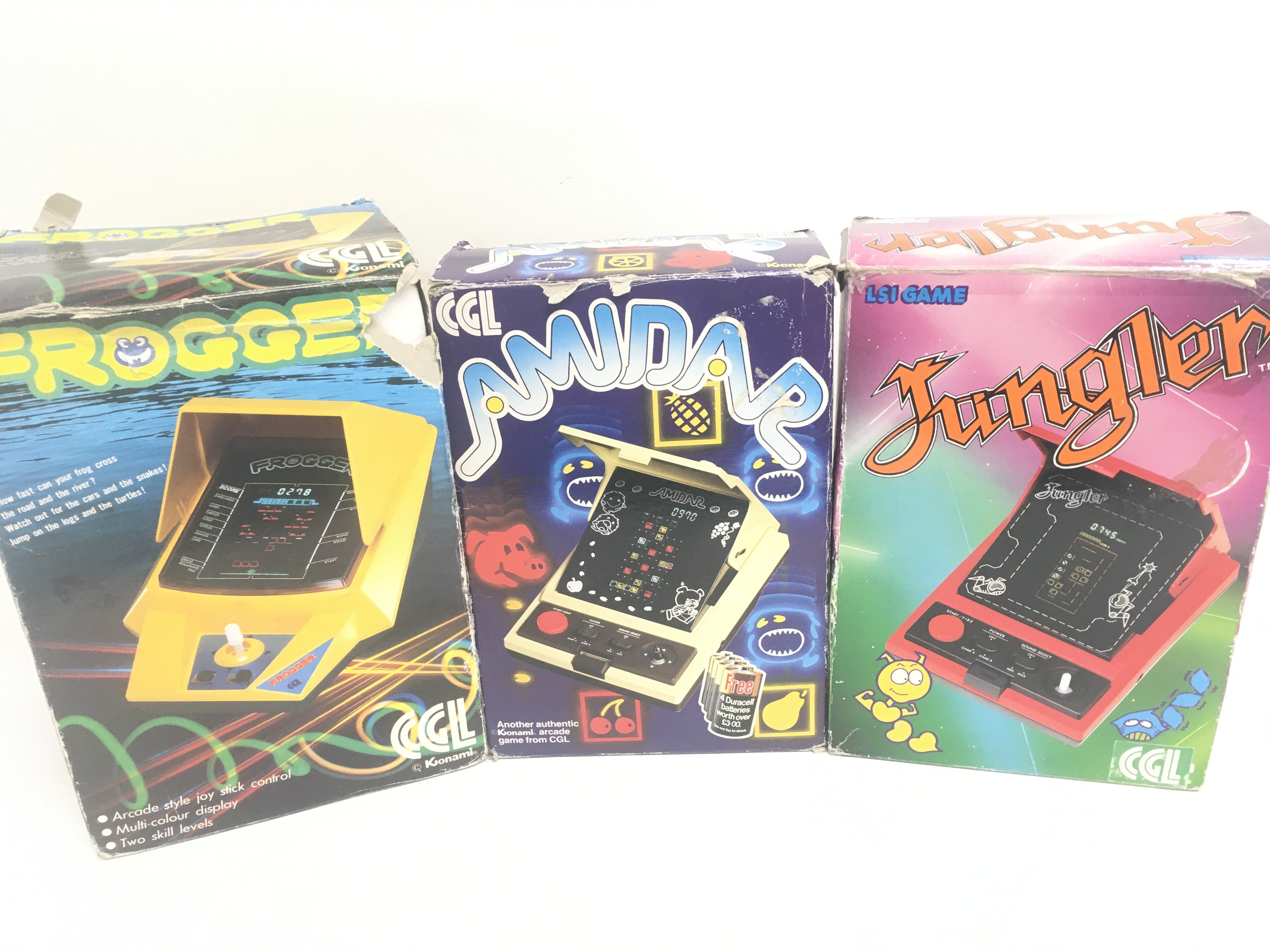 A Vintage Boxed Konami Frogger Game. A boxed Amida