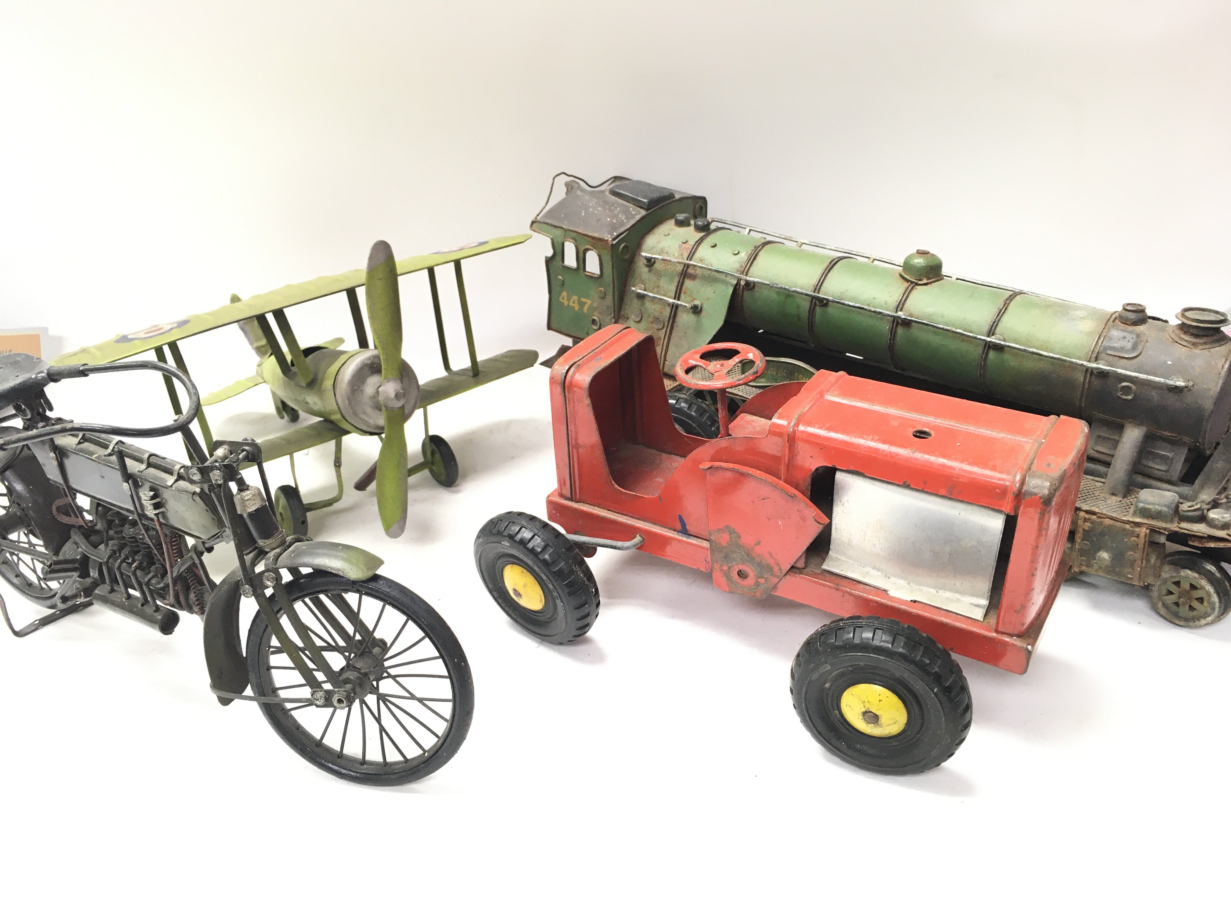 A Collection of Tin Plate Vehicles.