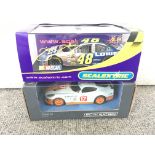 2 X Boxed Scalextric Cars. A Team GT Gulf and a NA