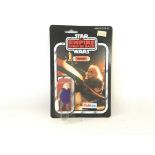 A vintage Palitoy Star Wars Ugnaught figure carded