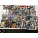 A collection of DC, The Phantom comics, as well as
