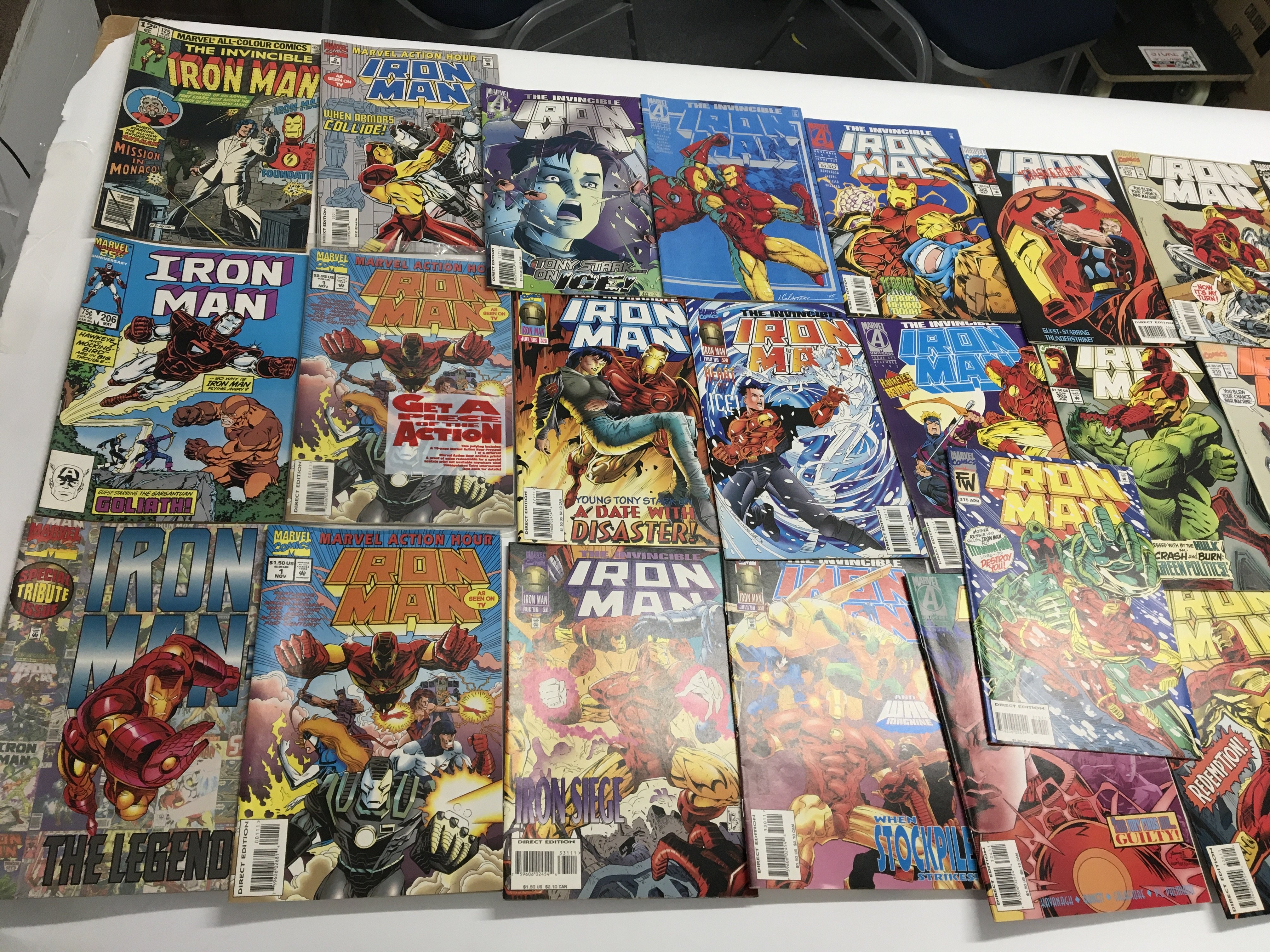 A collection of Iron Man Marvel comics approximate