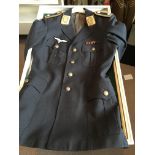 Two German Military jackets with applied badges pr