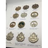 An album containing Military cap badges mainly cou