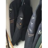 Four RAF uniform jackets with applied badges. (4)