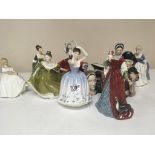 A collection of Royal Doulton lady figures includi