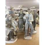 A collection of five Lladro figures various.