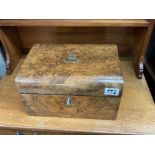 A Victorian walnut work box complete with silver p