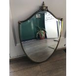A brass Edwardian style mirror with bevelled edge