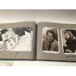 A album containing postcards various celebrities f