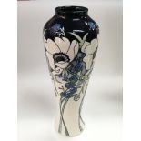 A limited edition Moorcroft tall vase by Nicola Slaney in White Splendour pattern, shape 121/14,