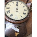 A oak drop dial wall clock the circular dial with