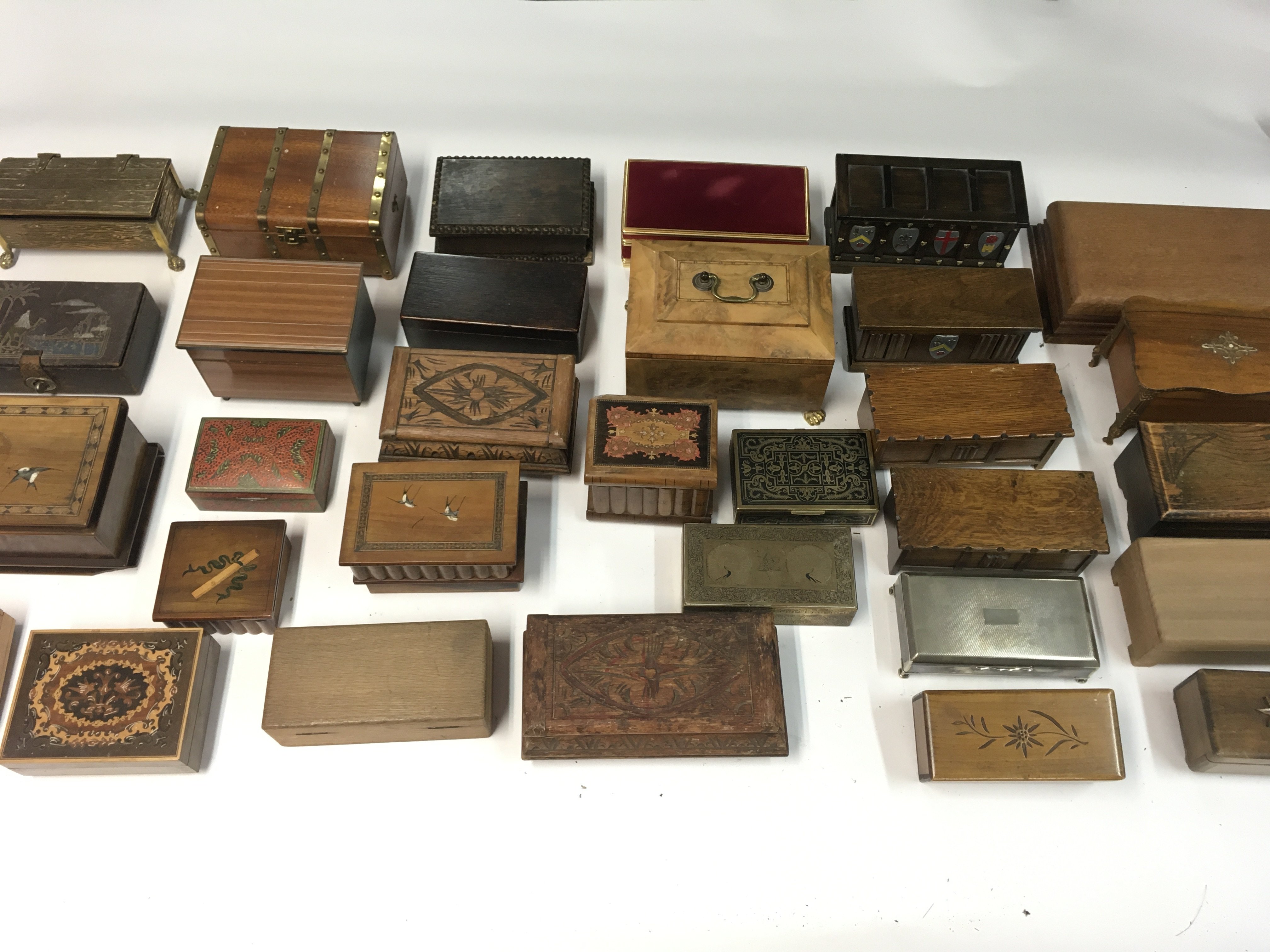 A collection of various music boxes and trinket bo