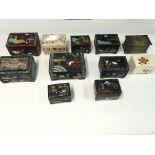 A collection of various music boxes and trinket bo