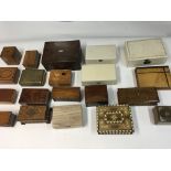 A collection of various music boxes and cigarette