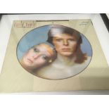A framed Special limited edition David Bowie Picture disc.