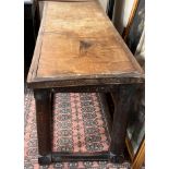 An early 19th century alter table with walnut inse