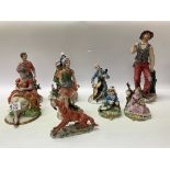 9 Capodimonte porcelain figures.