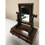 A Victorian small size dressing mirror with cushio