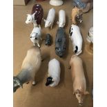 A collection of Beswick including pigs sheep and c