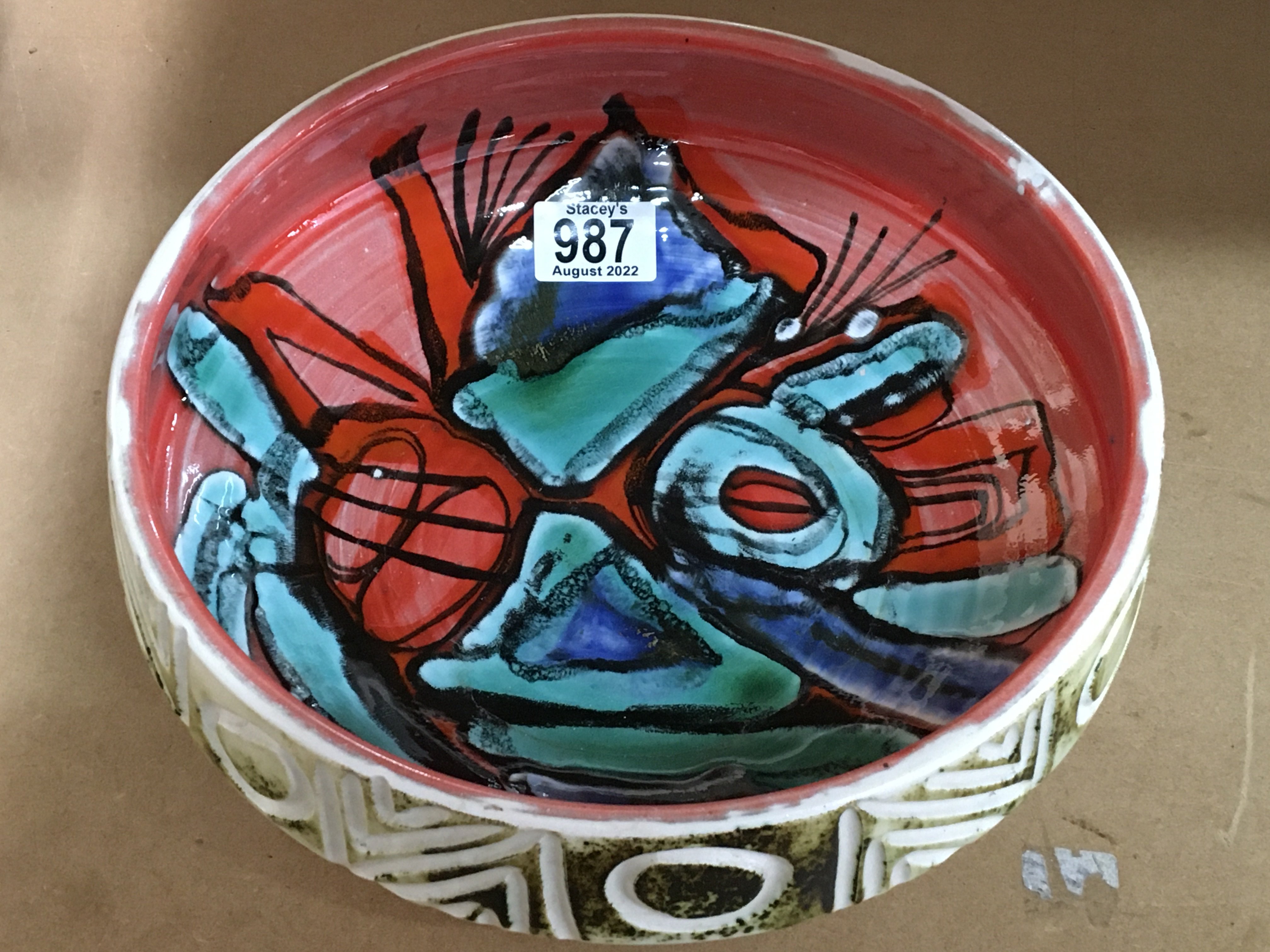 A 1960's Poole pottery bowl, the interior with a geometric design