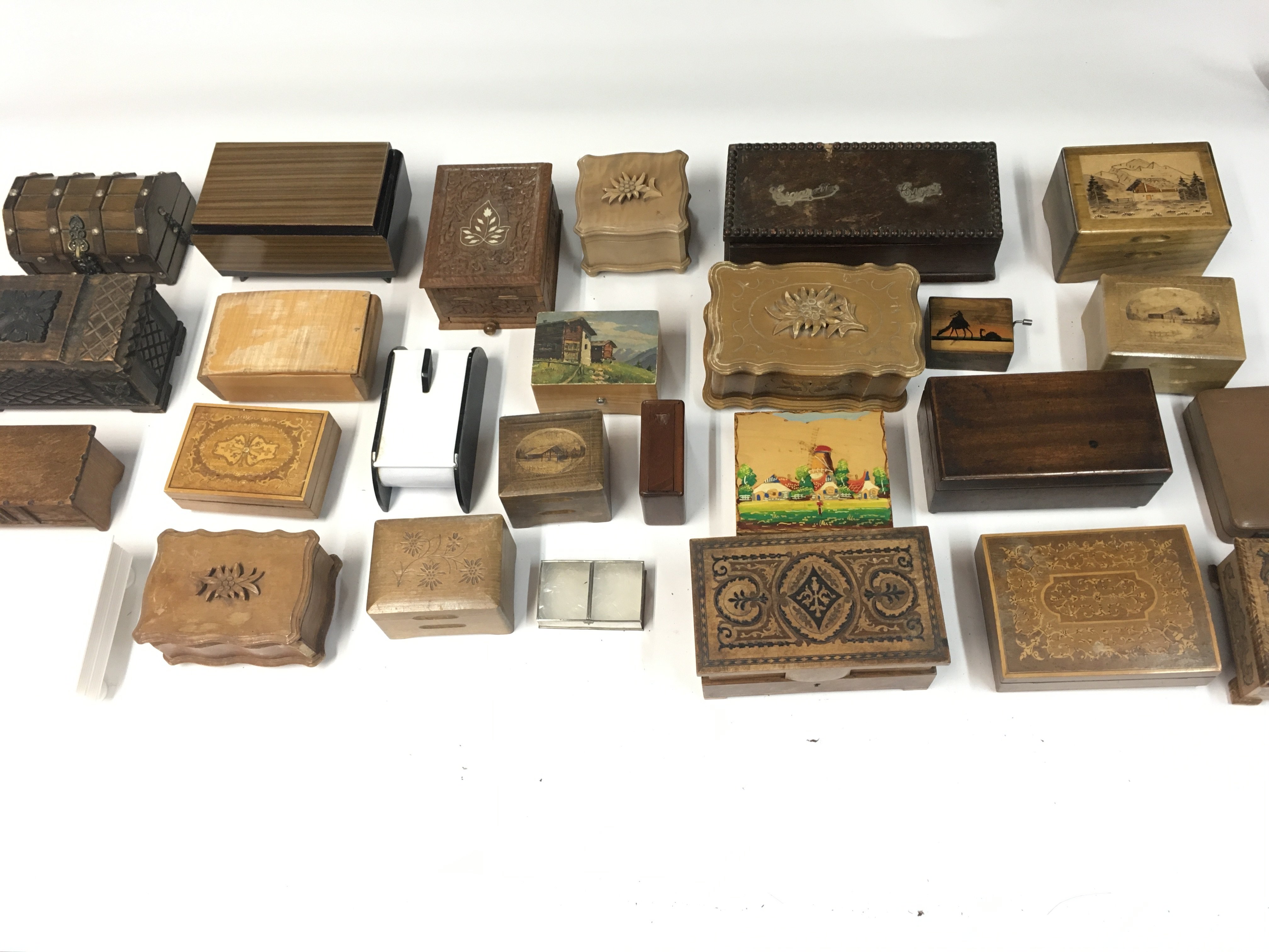 A collection of various music boxes and trinket bo