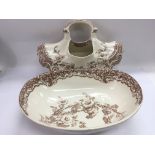 A Victorian jug and bowl set with floral decoratio